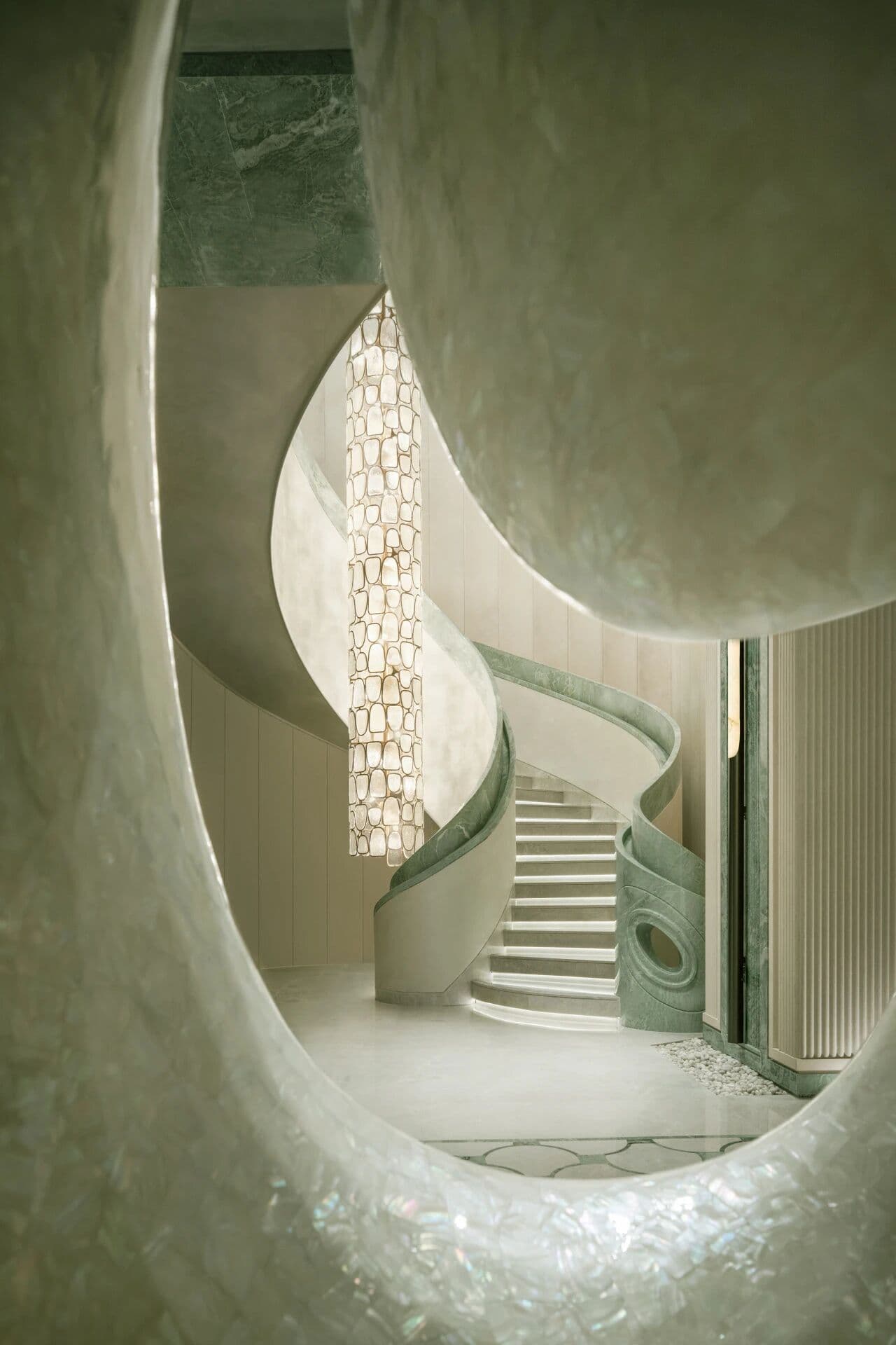 Sculptural staircase with bespoke feature lighting